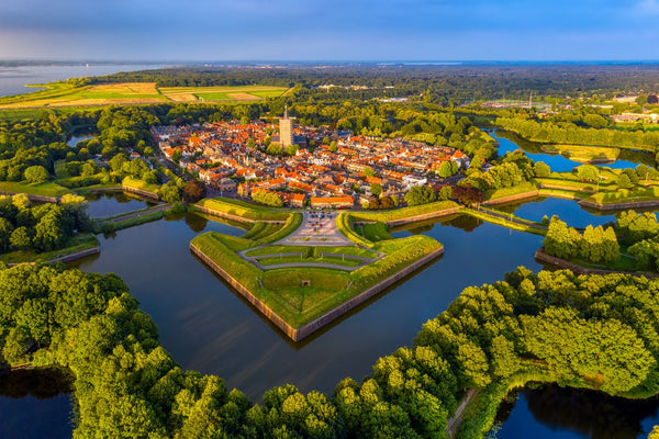 Explore Delft to Amsterdam: Culture, Veluwe & Canals