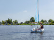 Familie strand-, bos- en stedentrip door Nederland